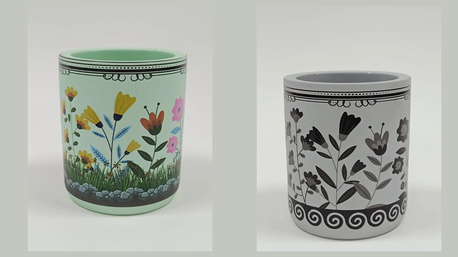 Two candle jars printed after pouring, a full-colour garden design on mint and a single-colour design on grey