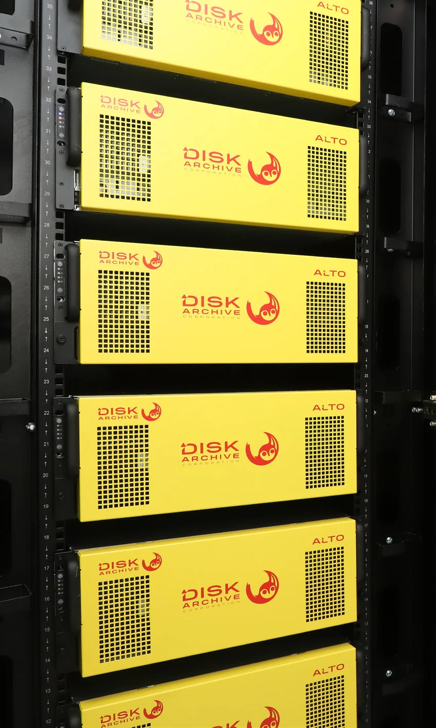 Yellow Disk Archive ALTO units stacked one above another in a black server rack