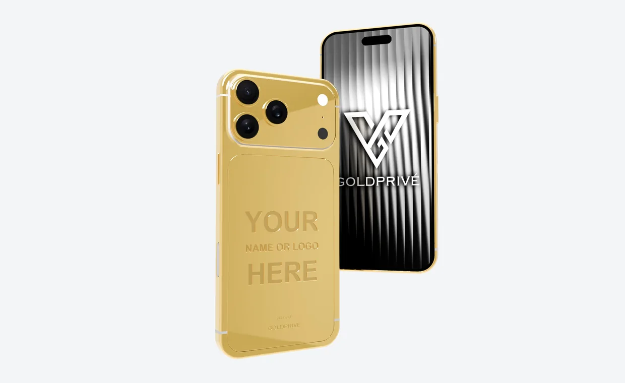Two GoldPrivé iPhone 18 Pro Max phones on light grey. The front phone shows a polished 24K gold back with the words YOUR NAME OR LOGO HERE engraved across it; behind it, the screen of a second phone shows the white GoldPrivé logo.