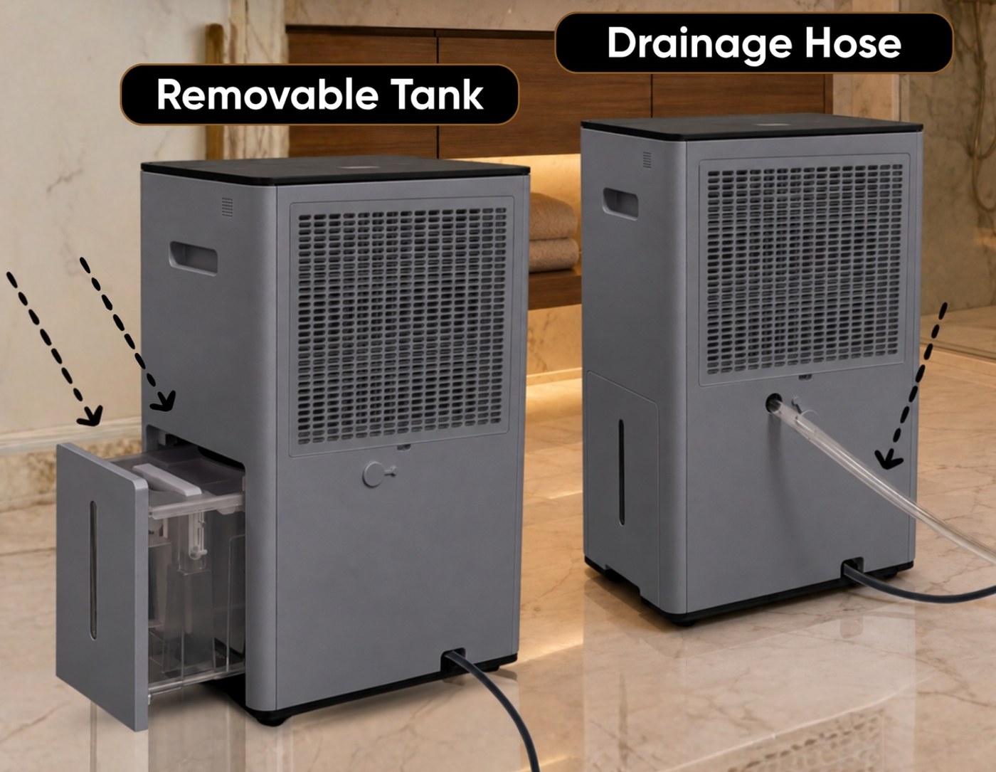 Rear view of two Stadler Form Lukas dehumidifiers in titanium grey, one with the water tank withdrawn and one with the drainage hose fitted