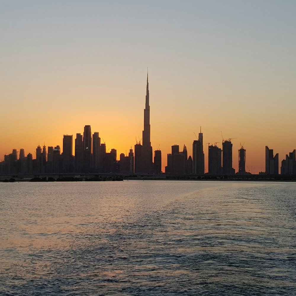 Dubai skyline in the evening, when after-hours business calls arrive