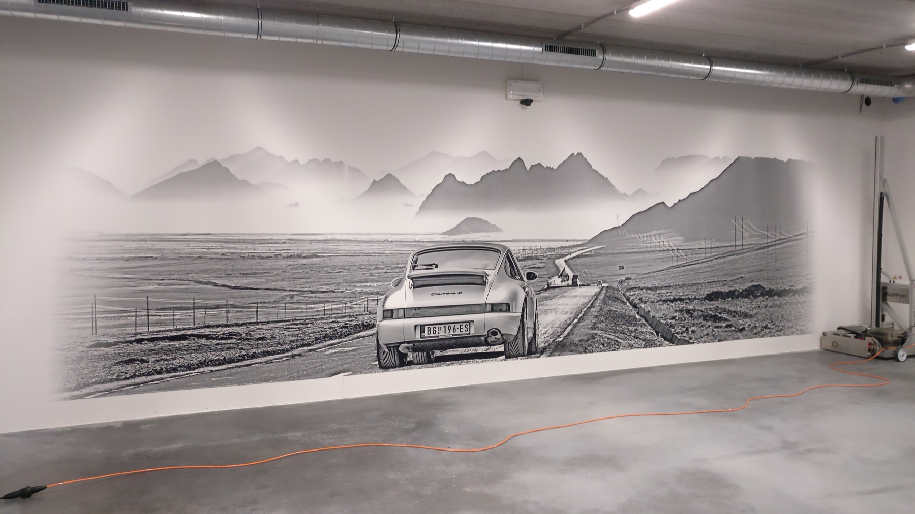 Wall mural printed directly onto a showroom wall by a wallPen UV wall printer