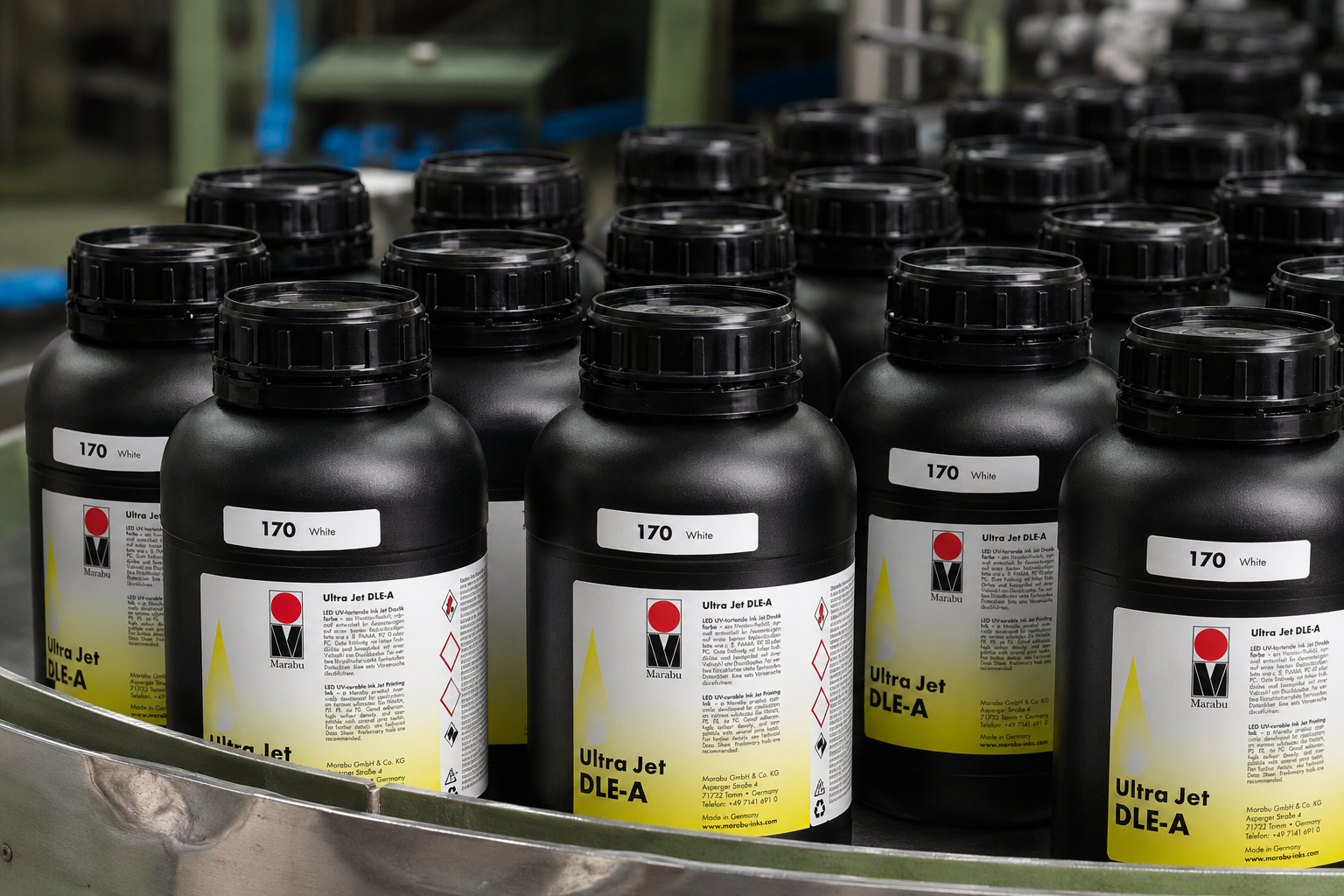 Marabu Ultra Jet DUV-A UV ink bottles with printed metal, glass and acrylic samples