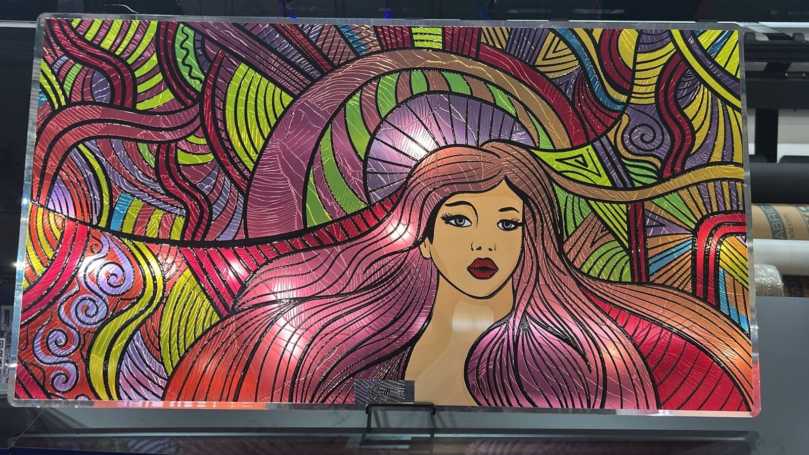 Stained glass effect artwork printed directly onto a glass panel with raised varnish texture