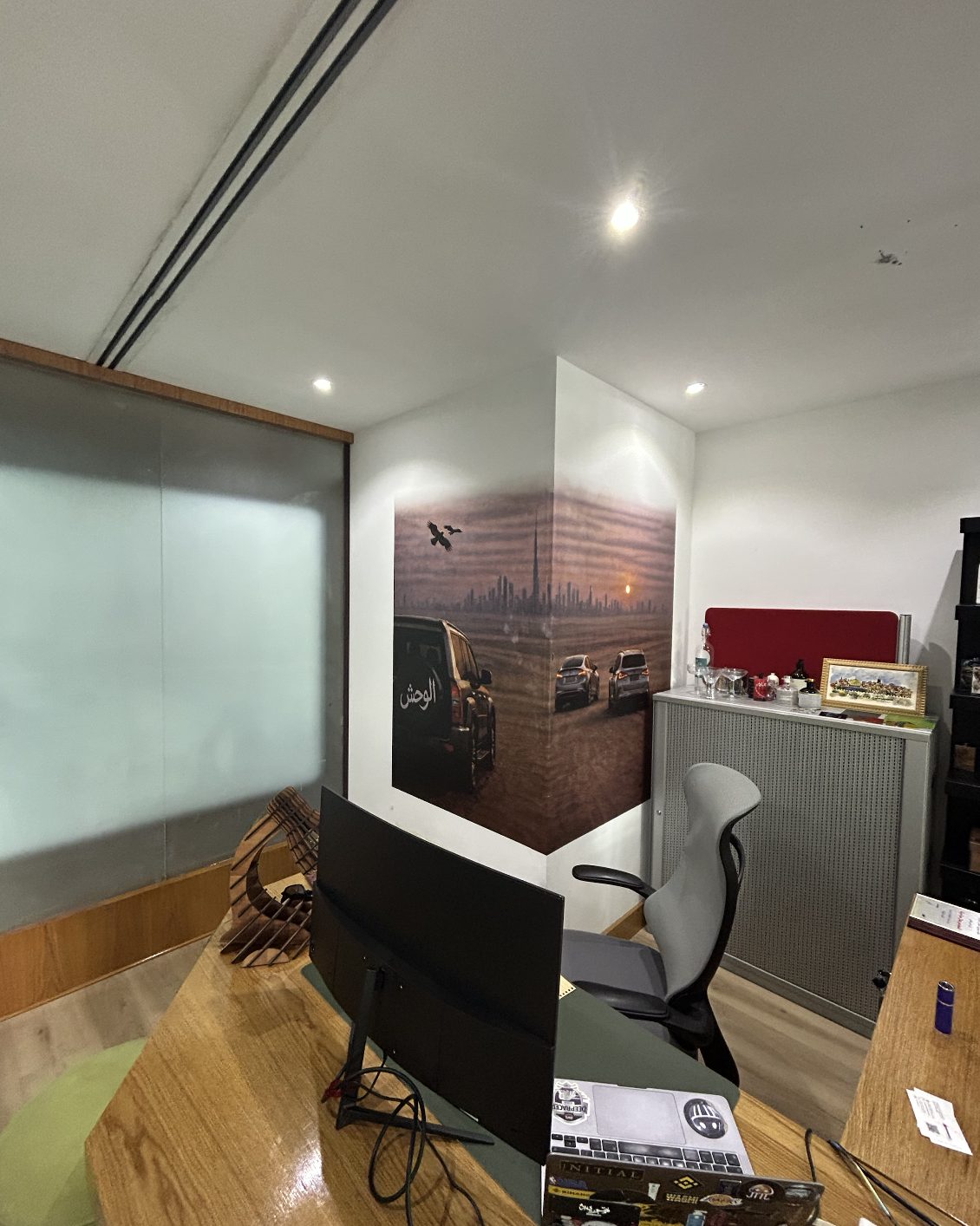 Dubai skyline artwork wall-printed around an office corner onto the final surface